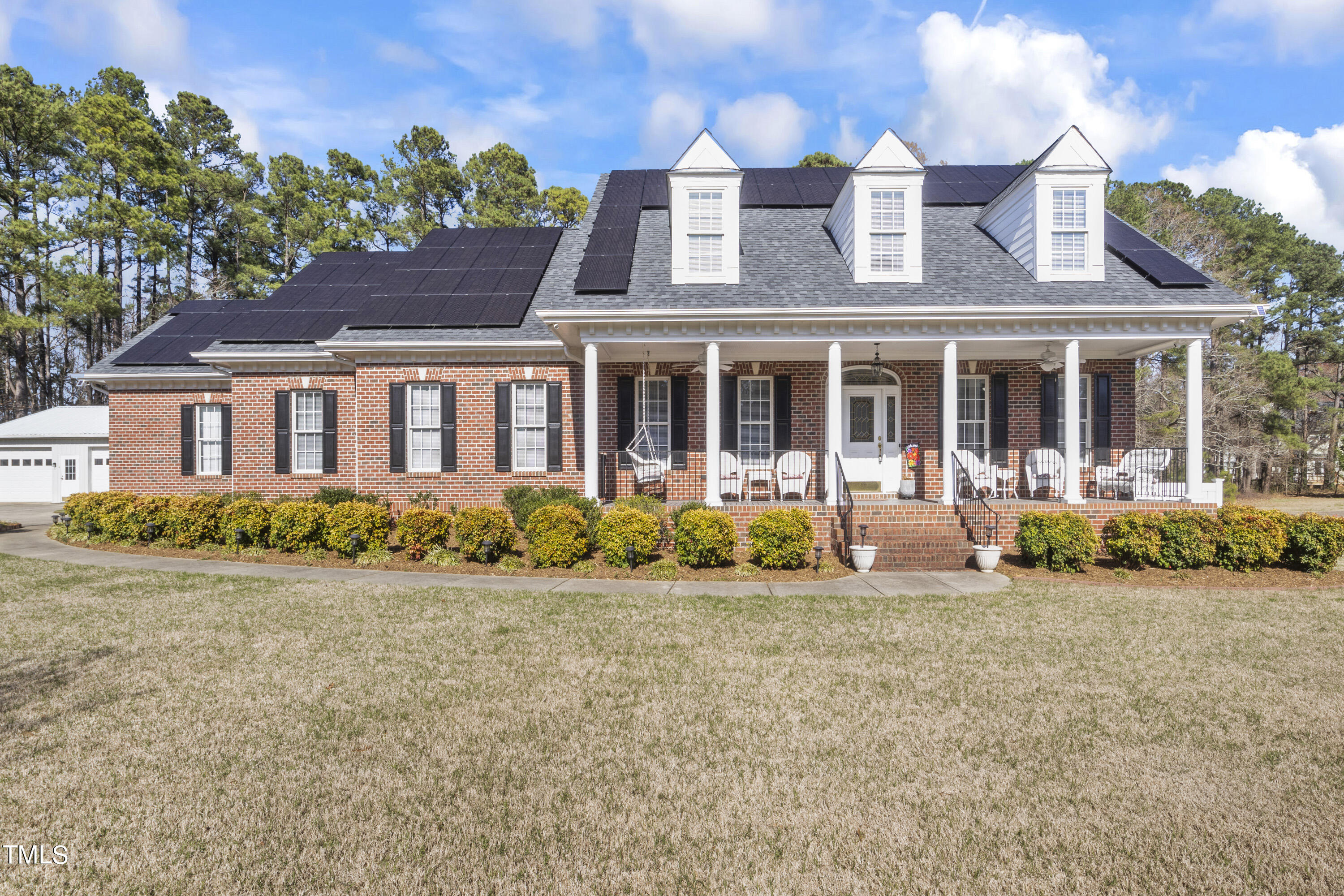 5504 Yates Mill Pond Road Raleigh, NC 27606 - Photo 2 of 56 front view of a house with a yard