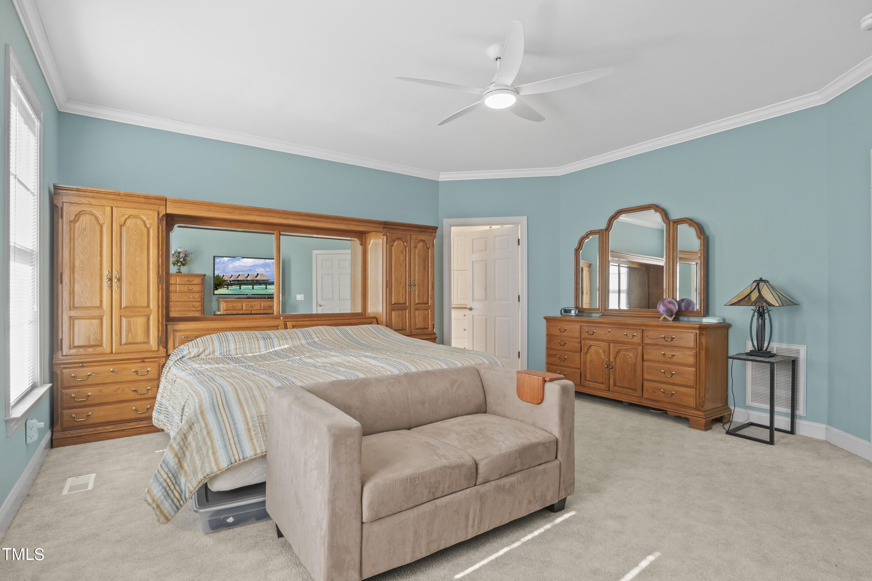 5504 Yates Mill Pond Road Raleigh, NC 27606 - Photo 20 of 56 a bed room with a bed and a window
