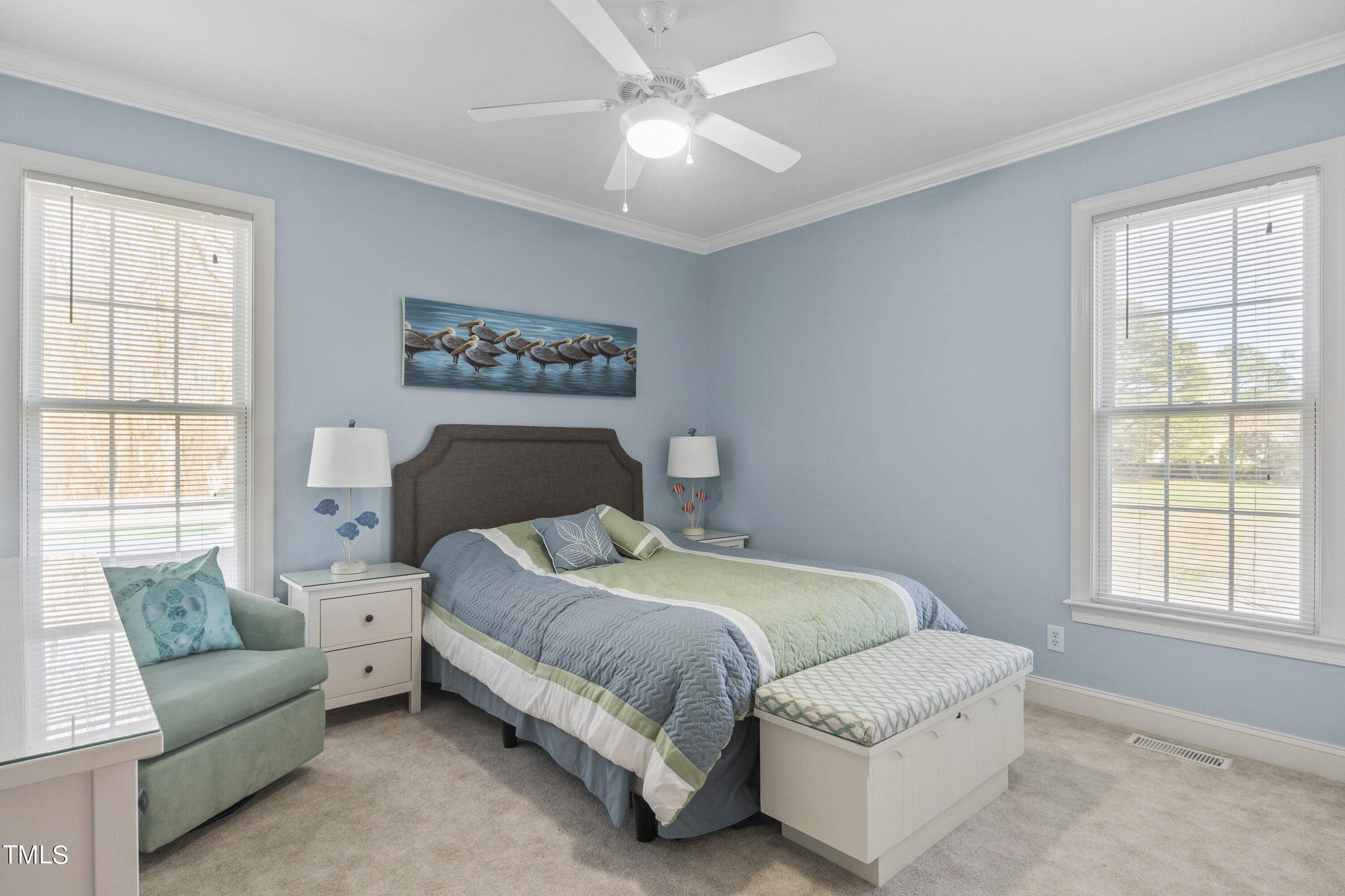 5504 Yates Mill Pond Road Raleigh, NC 27606 - Photo 23 of 56 a bedroom with a bed couch and window