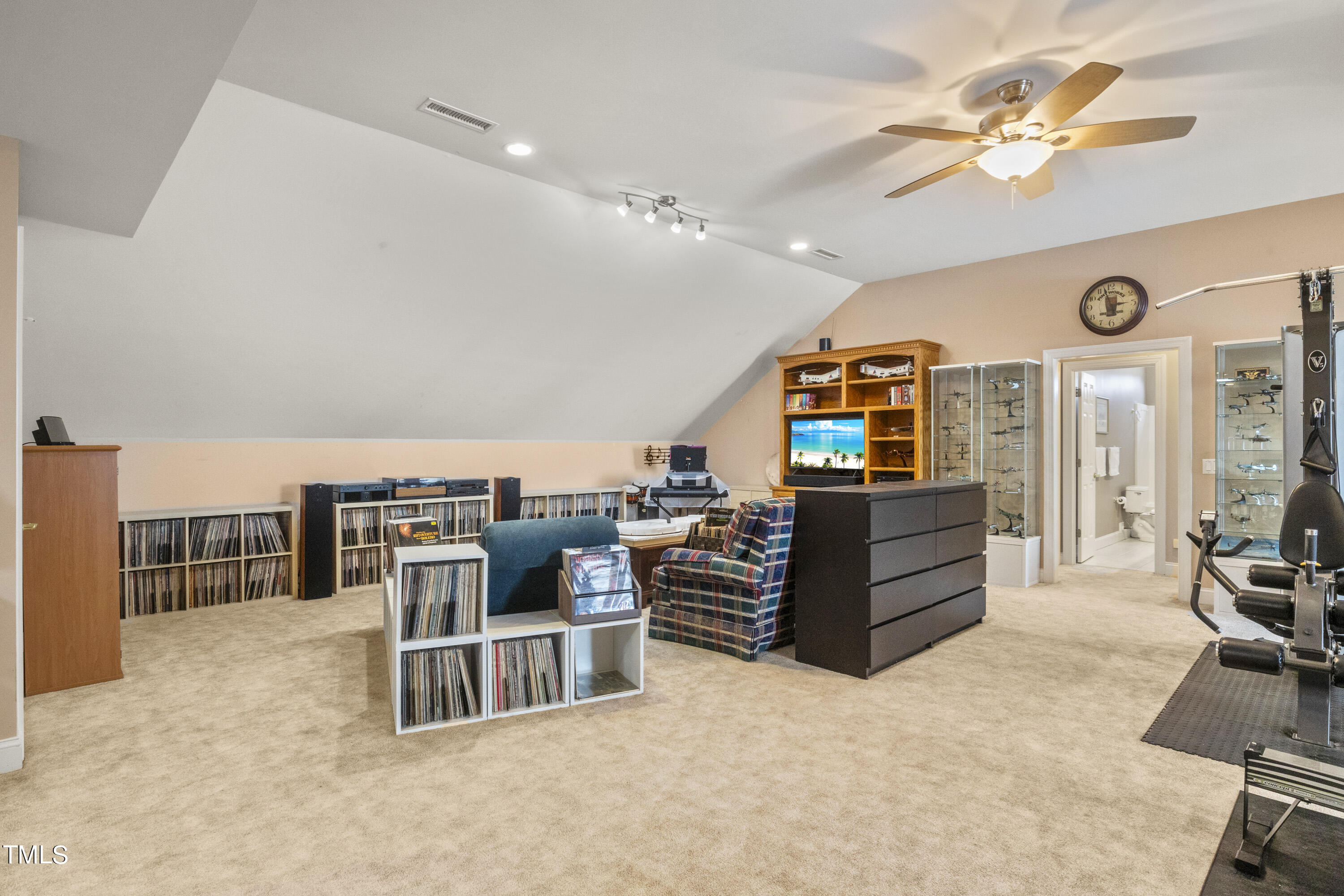 5504 Yates Mill Pond Road Raleigh, NC 27606 - Photo 29 of 56 a living room with furniture and a flat screen tv