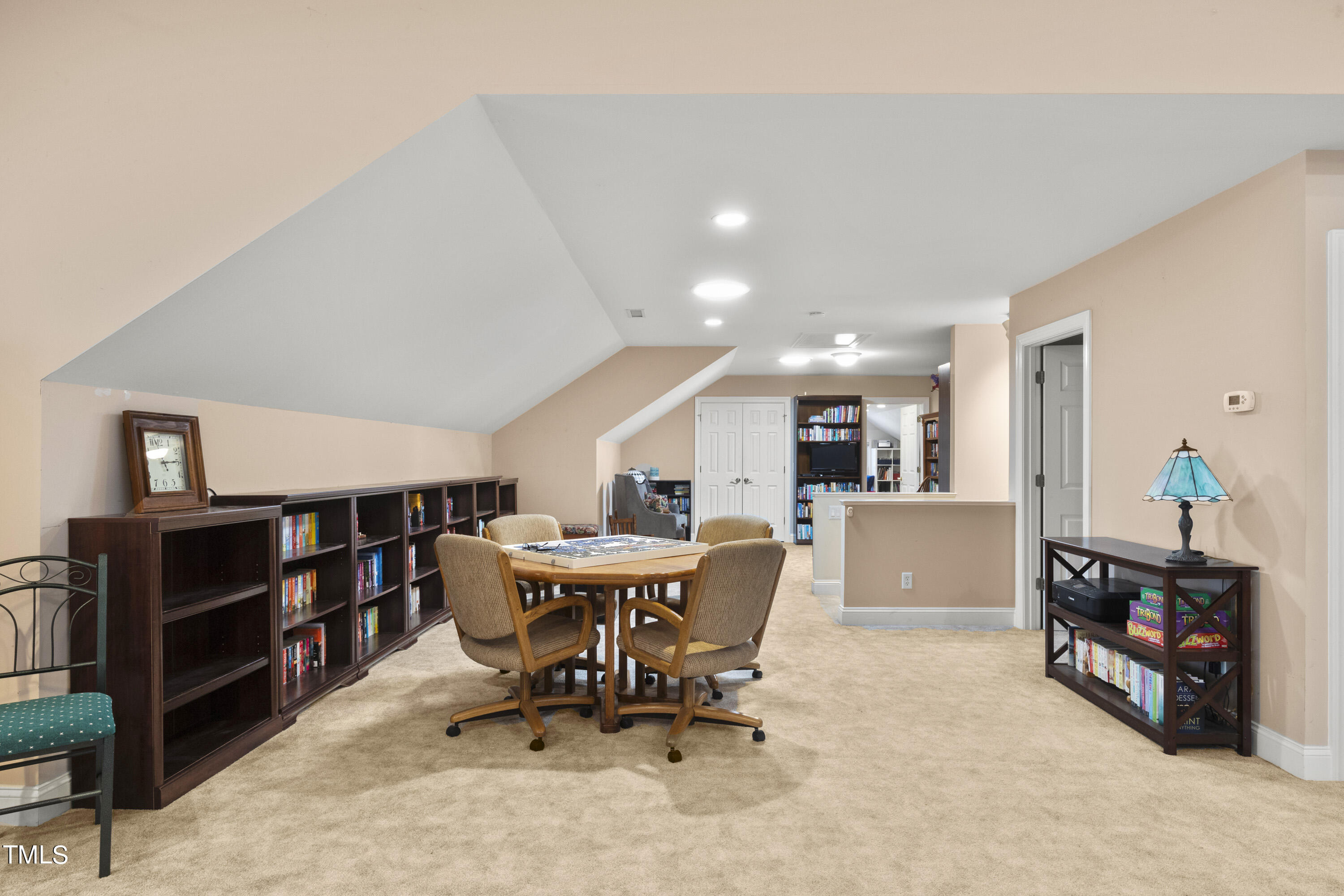 5504 Yates Mill Pond Road Raleigh, NC 27606 - Photo 30 of 56 a view of a dining room with furniture and a kitchen