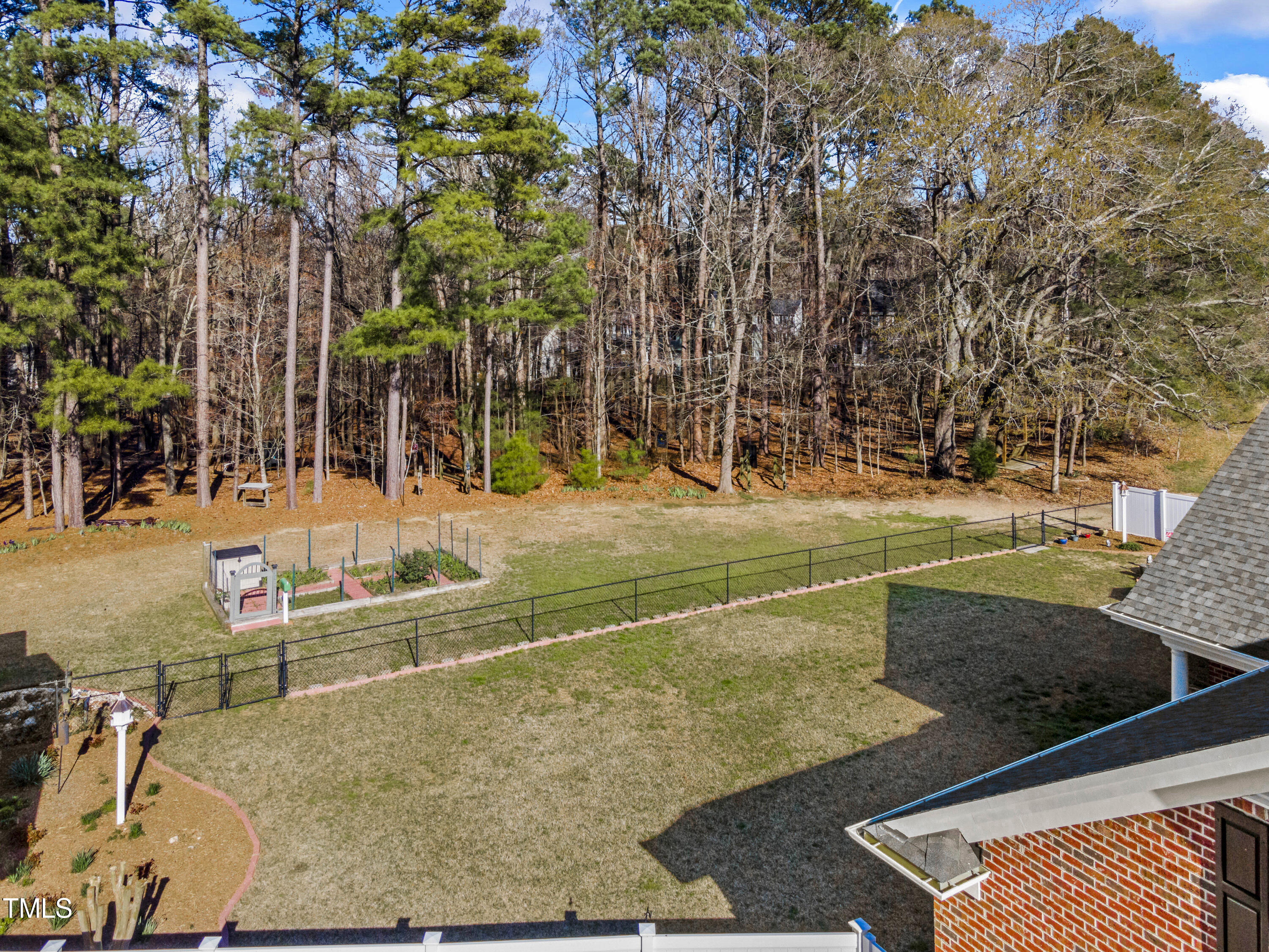 5504 Yates Mill Pond Road Raleigh, NC 27606 - Photo 45 of 56 a view of a yard with basketball court