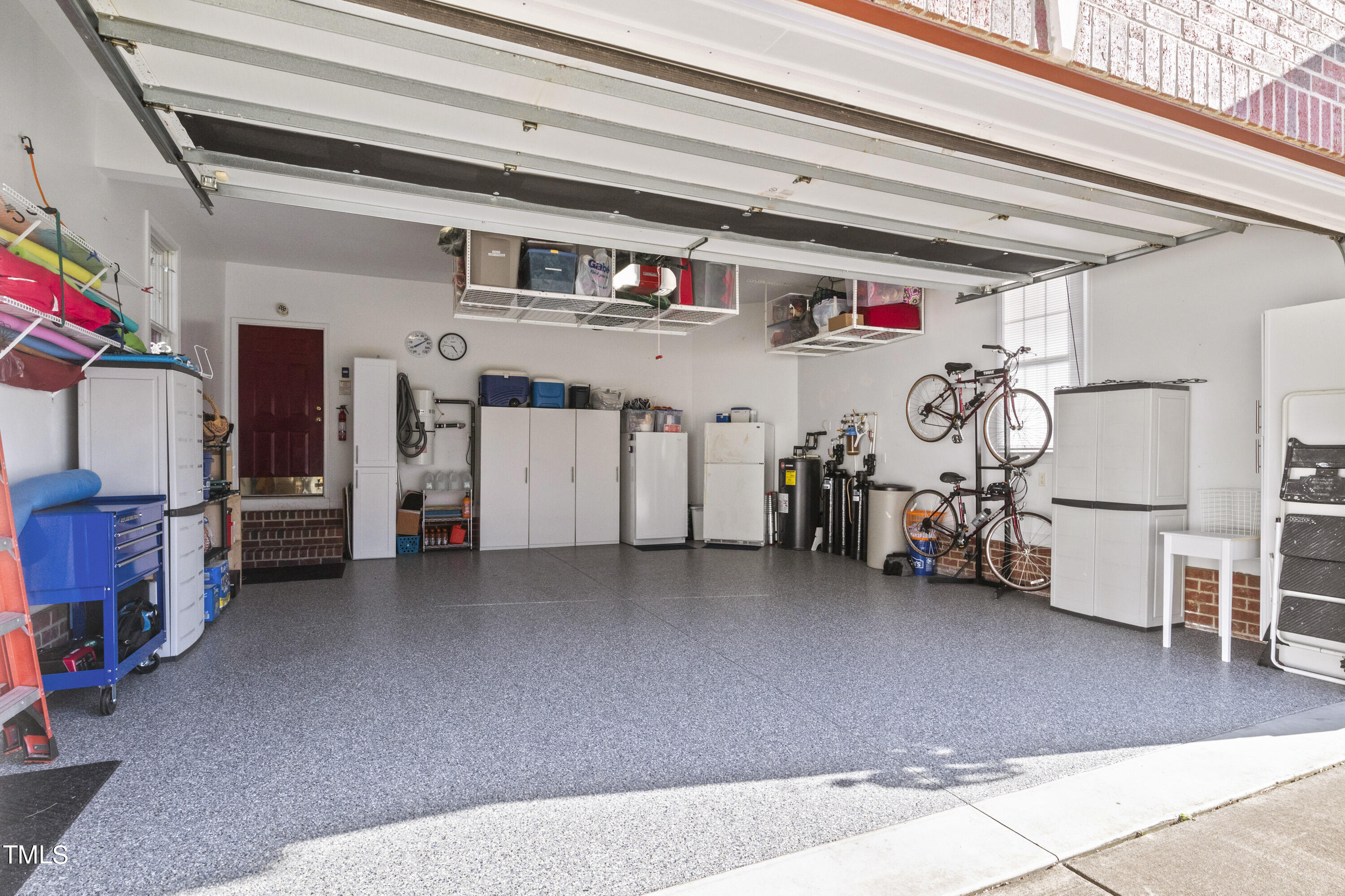 5504 Yates Mill Pond Road Raleigh, NC 27606 - Photo 46 of 56 a view of a garage with storage