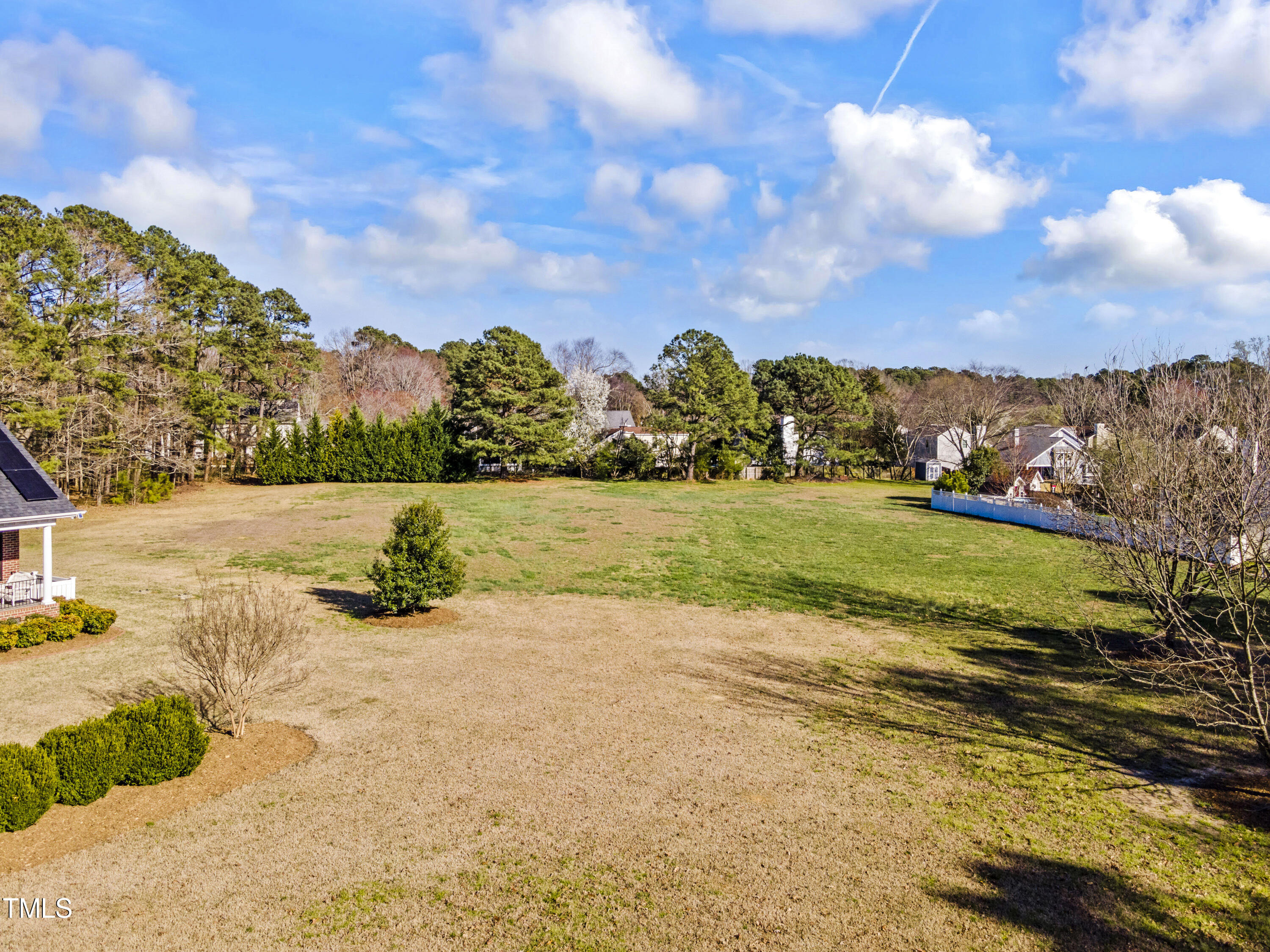 5504 Yates Mill Pond Road Raleigh, NC 27606 - Photo 48 of 56 a view of an outdoor space and a yard