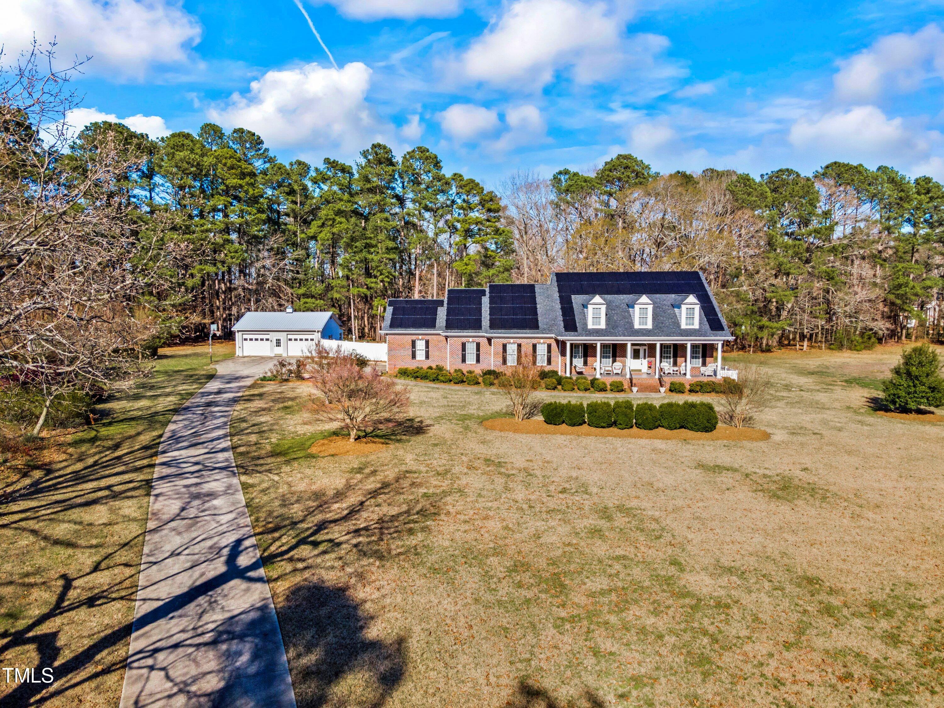 5504 Yates Mill Pond Road Raleigh, NC 27606 - Photo 55 of 56 a view of a swimming pool with an outdoor seating