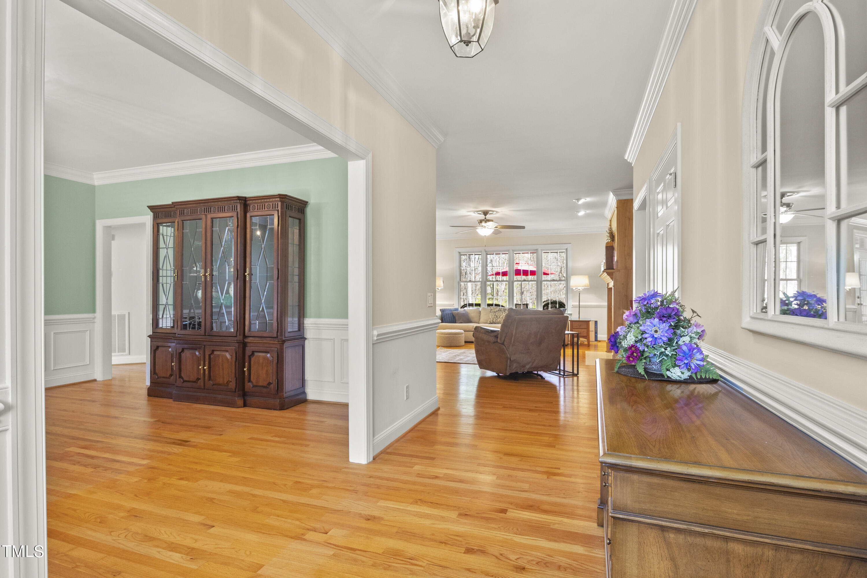 5504 Yates Mill Pond Road Raleigh, NC 27606 - Photo 8 of 56 a living room with furniture and large windows