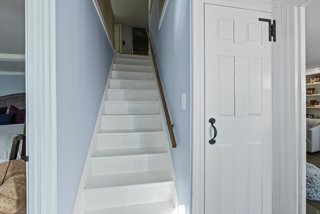 5 Depot Road Truro, MA 02666 - Photo 30 of 42 a view of staircase with white walls and white door