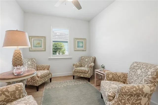 a bedroom with furniture and a window