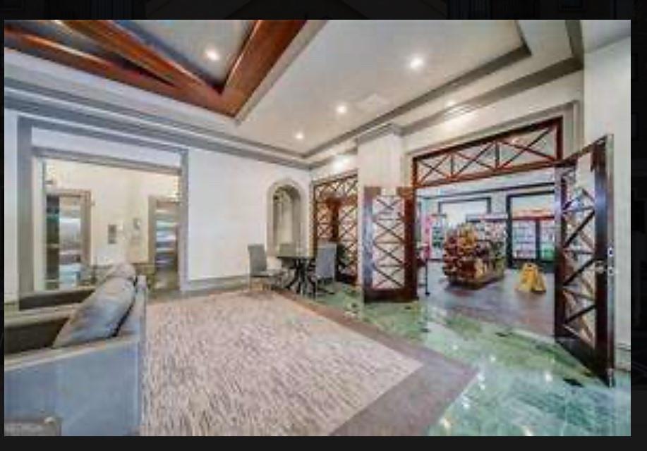 795 Hammond Drive, Unit 210 Atlanta, GA 30328 - Photo 2 of 18 a view of a room with gym equipment