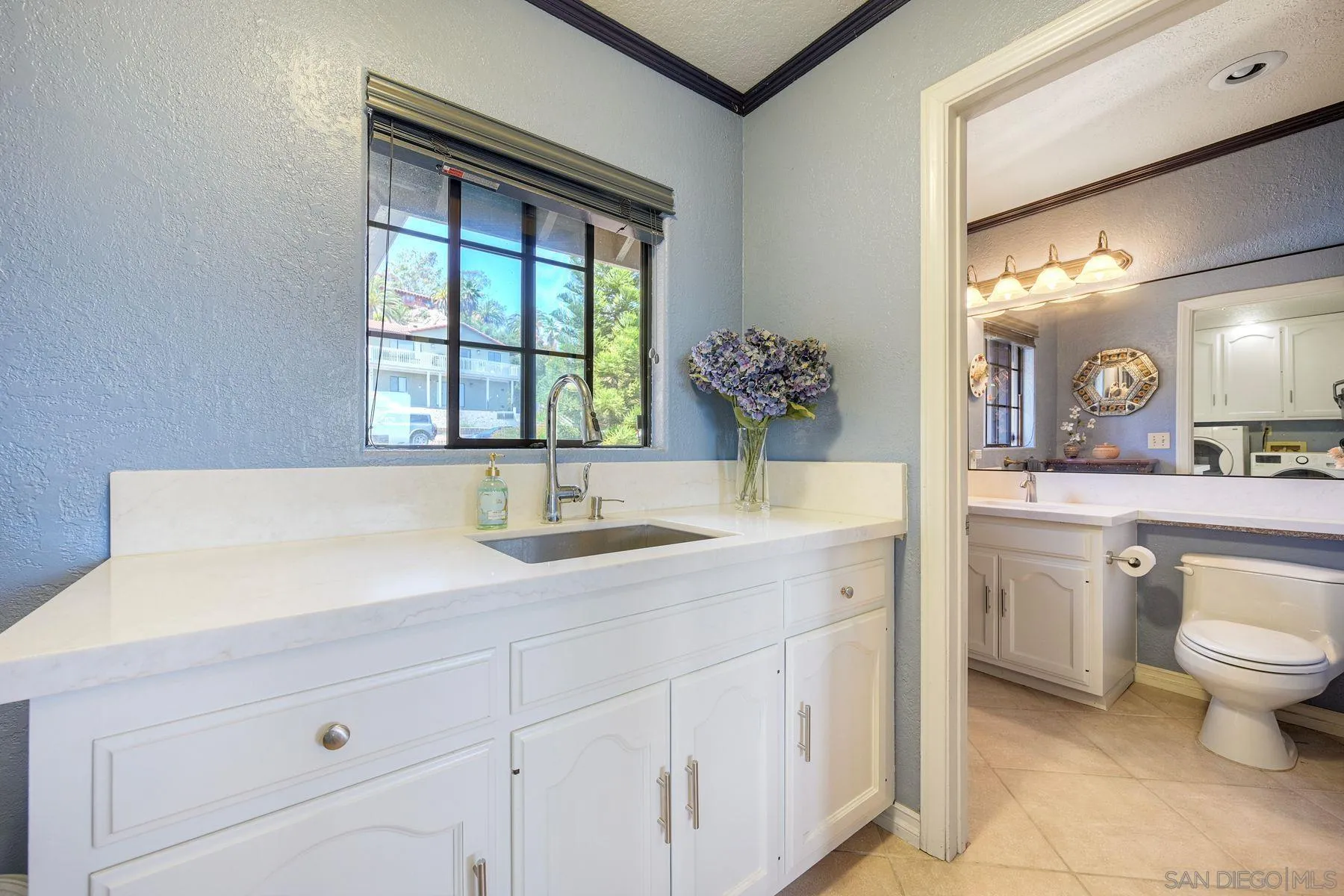 1419 Rimrock Drive Escondido, CA 92027 - Photo 13 of 47 Bathroom & Laundry Room off Kitchen.