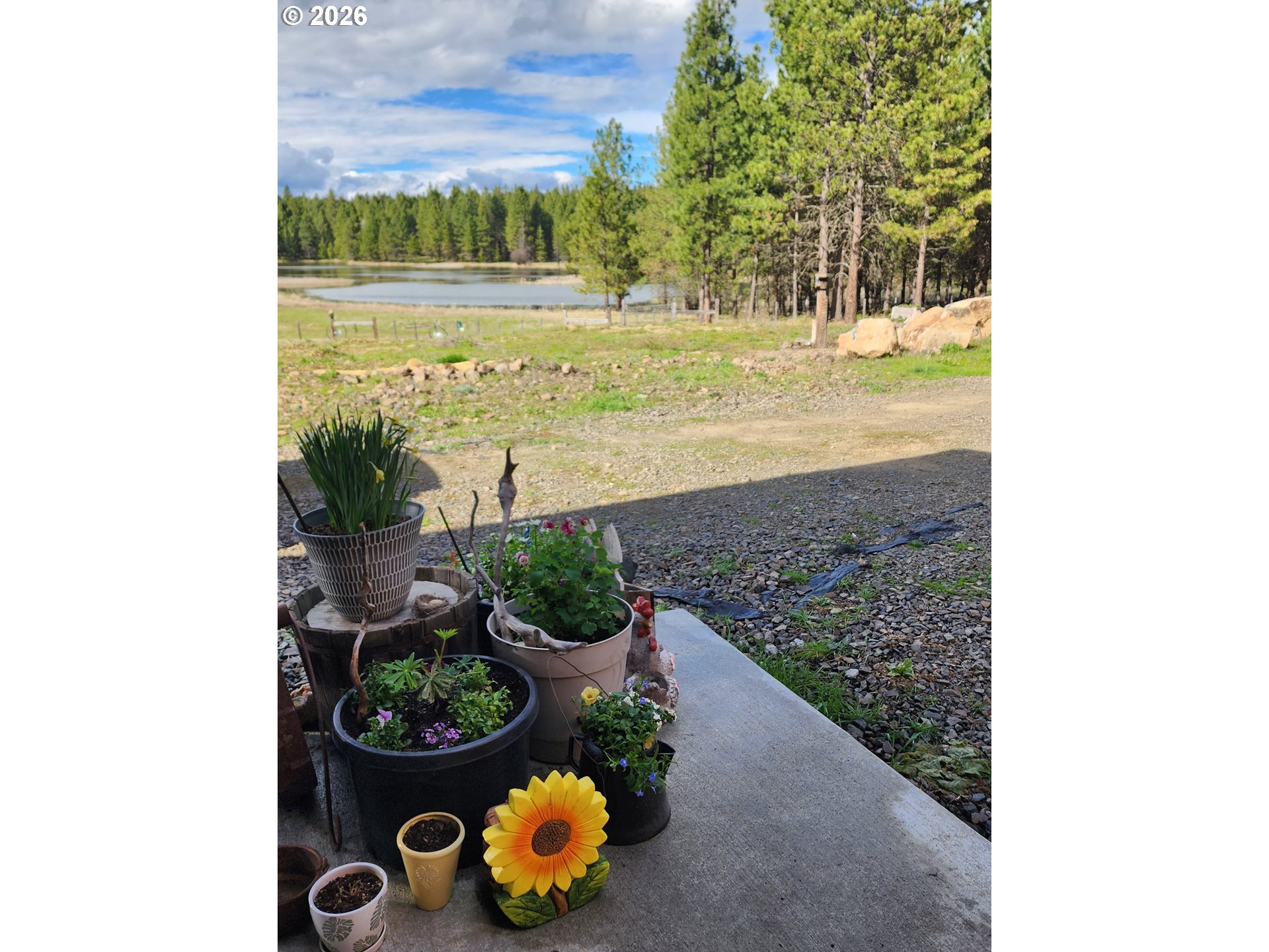 73210 Kingsbury Lane Elgin, OR 97827 - Photo 30 of 37 a view of a garden with an outdoor seating