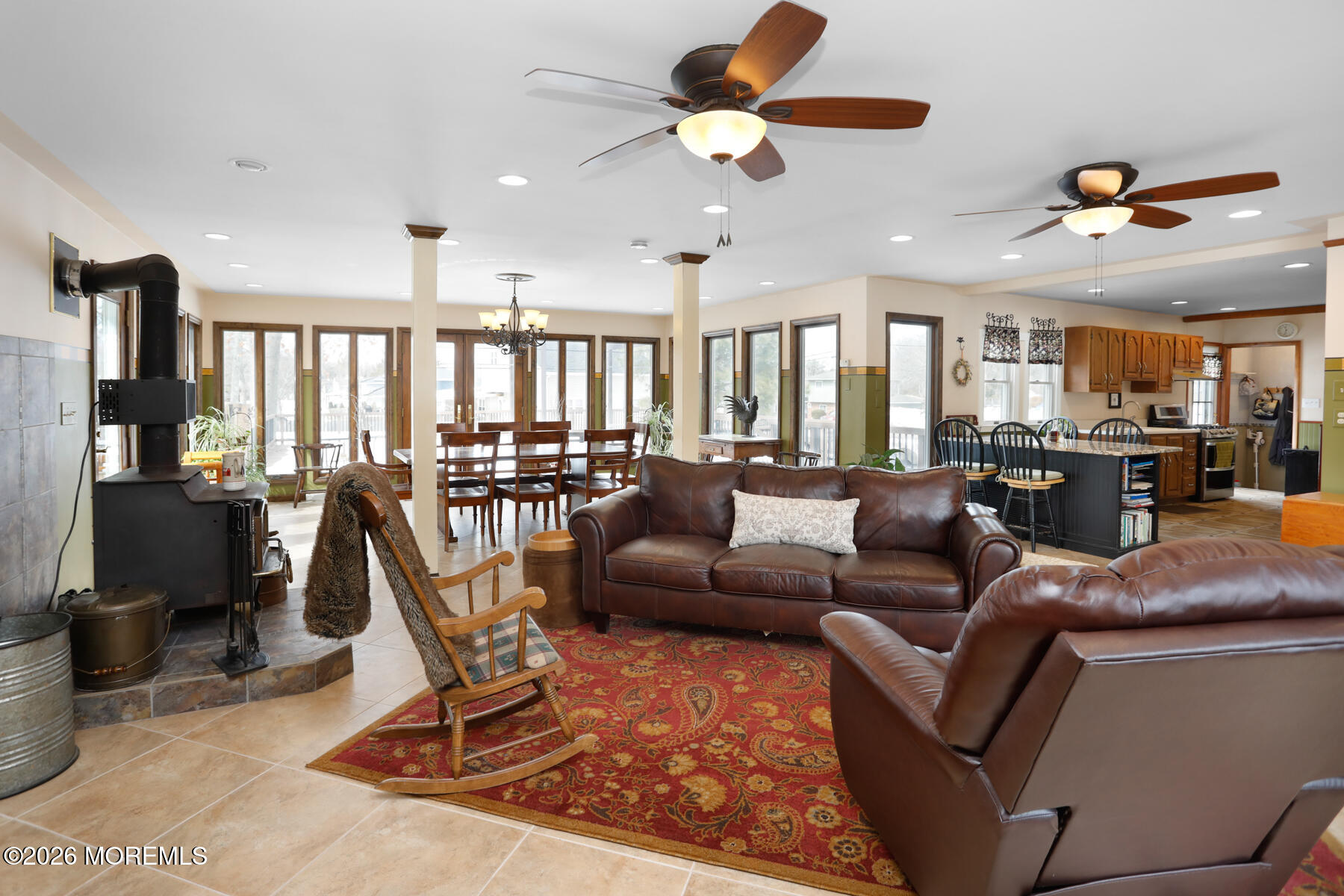 60 Sunset Drive Howell, NJ 07731 - Photo 17 of 56 a living room with furniture a ceiling fan and a rug