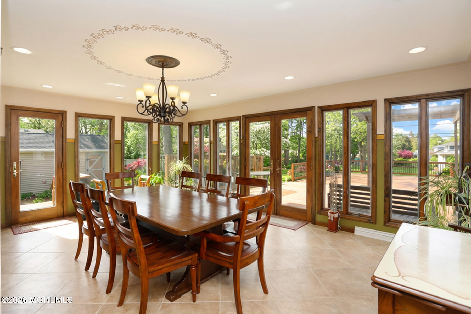 60 Sunset Drive Howell, NJ 07731 - Photo 18 of 56 a dining room with furniture a chandelier and wooden floor