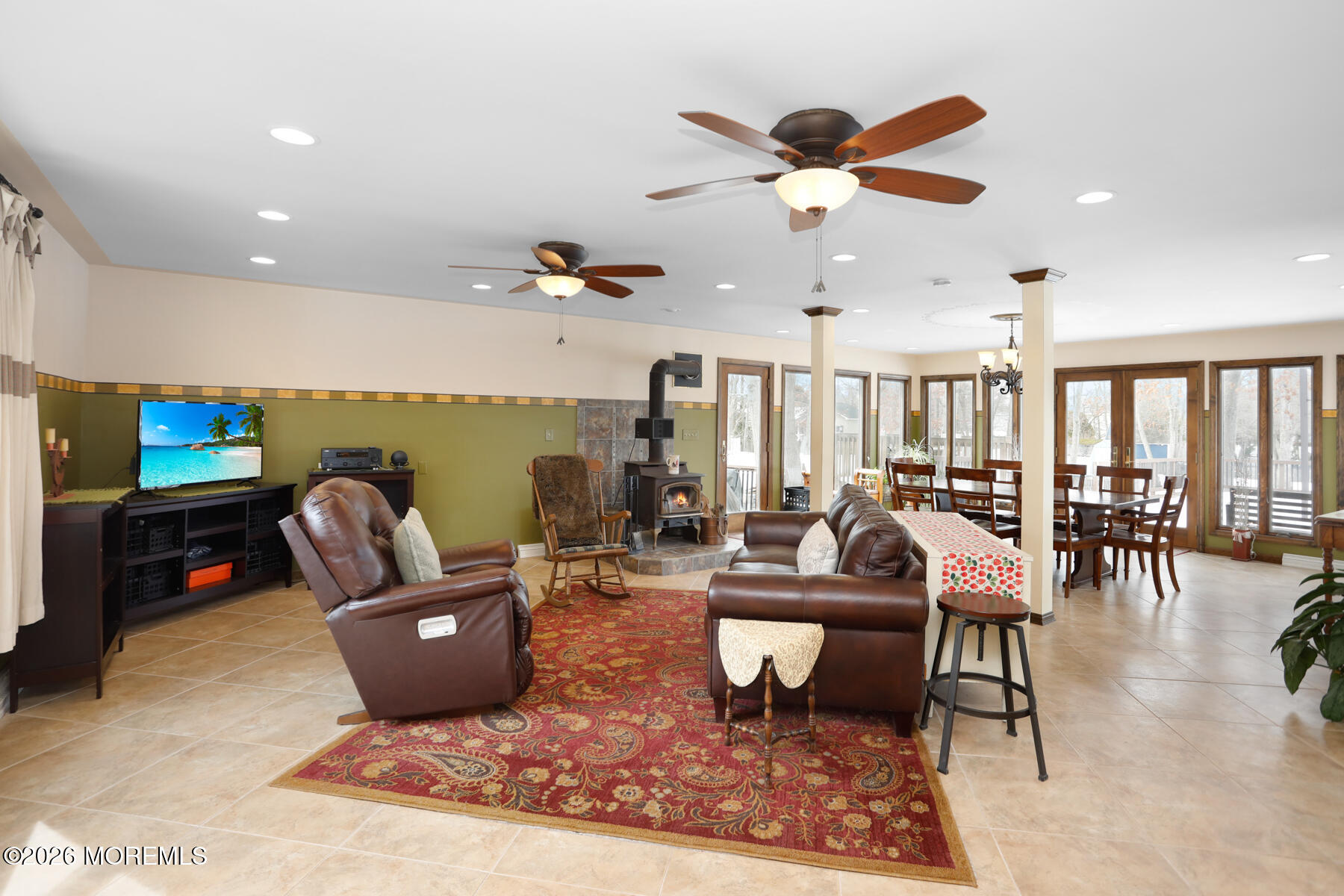 60 Sunset Drive Howell, NJ 07731 - Photo 19 of 56 a living room with furniture and a floor to ceiling window