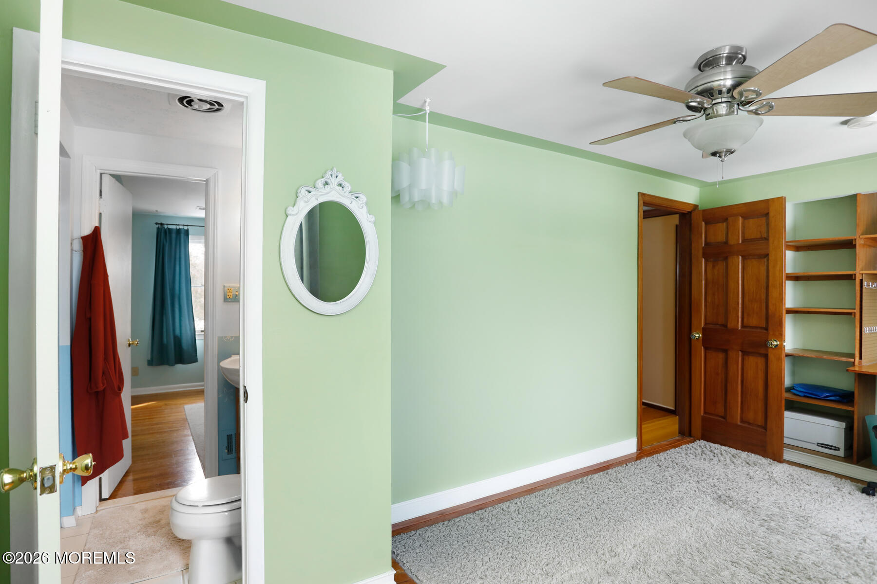 60 Sunset Drive Howell, NJ 07731 - Photo 25 of 56 a bathroom with a toilet a sink and a mirror