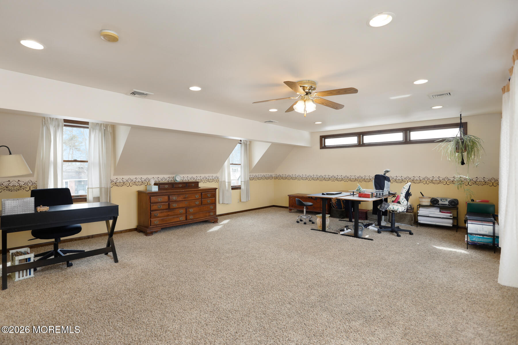 60 Sunset Drive Howell, NJ 07731 - Photo 30 of 56 a living room with furniture and a ceiling fan