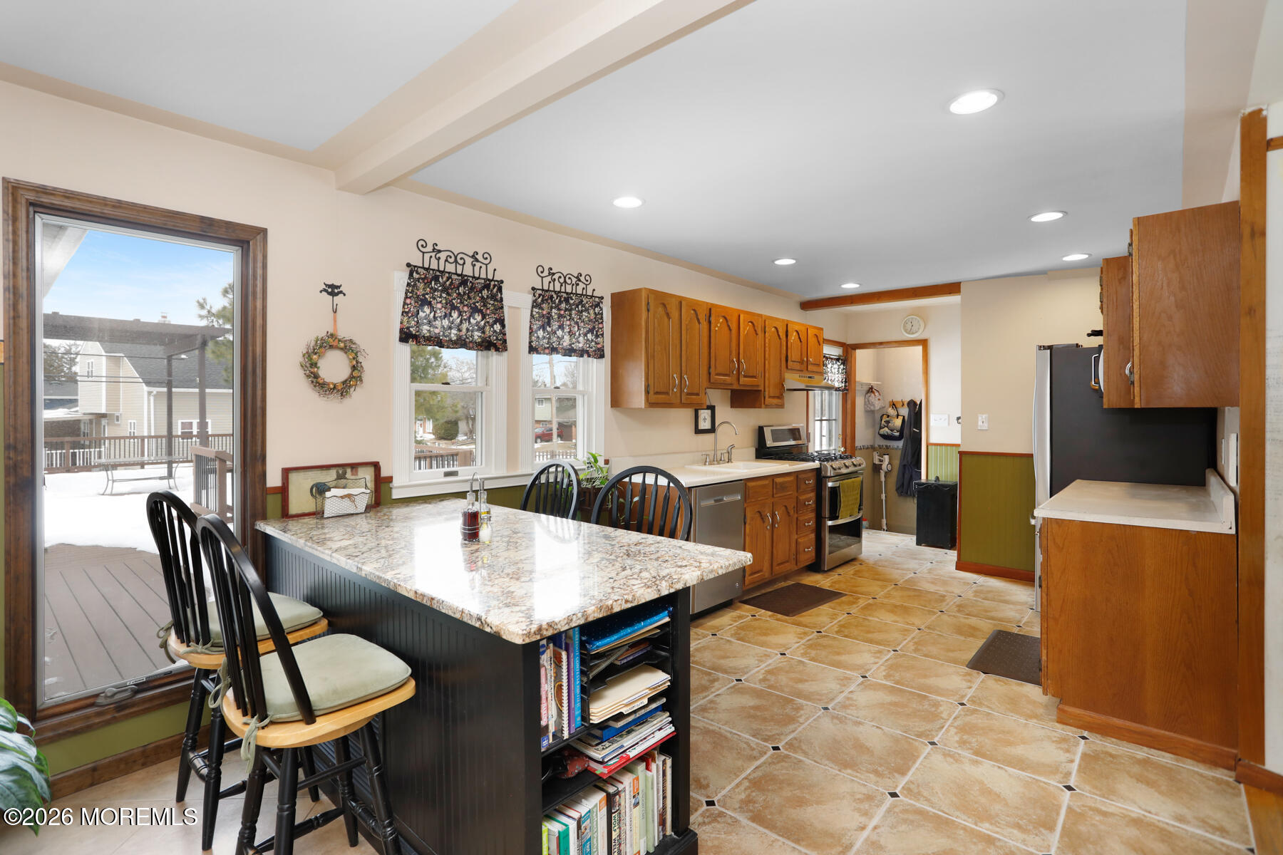 60 Sunset Drive Howell, NJ 07731 - Photo 3 of 56 a kitchen with a table and chairs in it