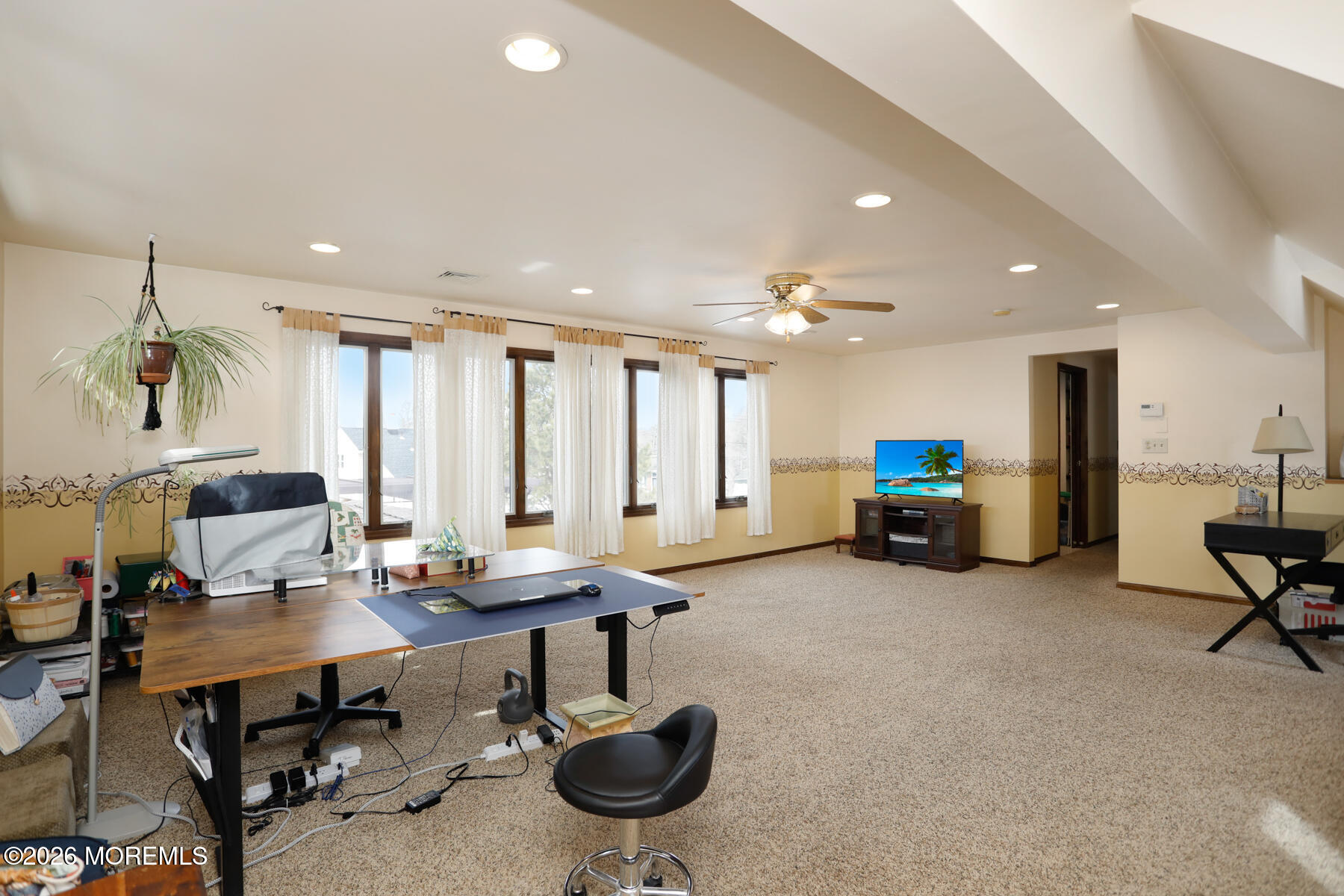 60 Sunset Drive Howell, NJ 07731 - Photo 31 of 56 a living room with furniture a table and kitchen view