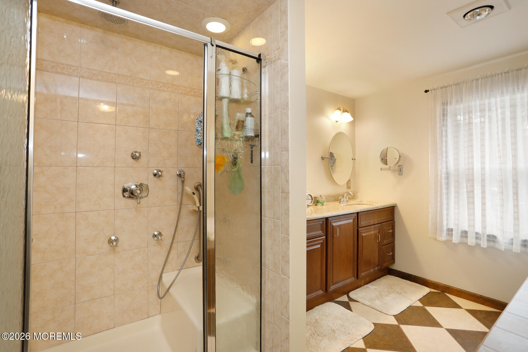 60 Sunset Drive Howell, NJ 07731 - Photo 34 of 56 a spacious bathroom with a shower and a sink