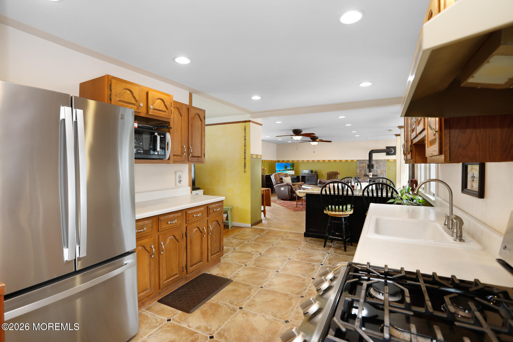60 Sunset Drive Howell, NJ 07731 - Photo 4 of 56 a kitchen with stainless steel appliances granite countertop a refrigerator and a sink
