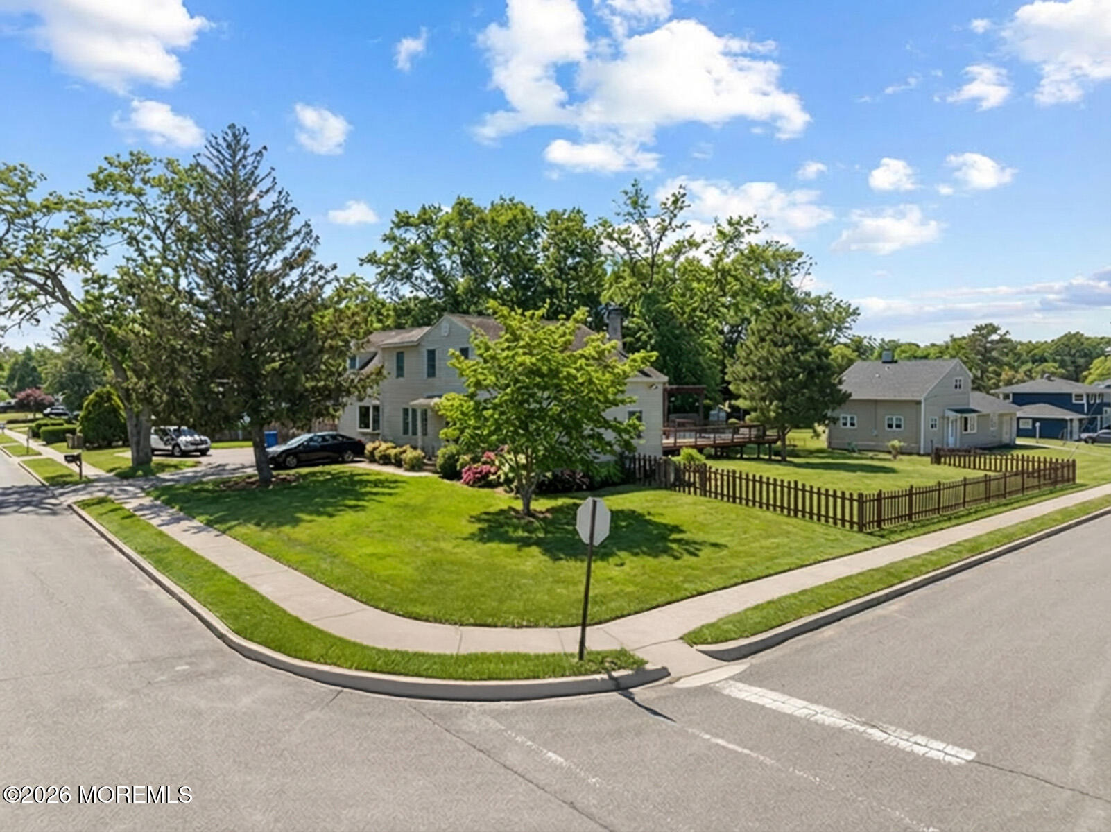 60 Sunset Drive Howell, NJ 07731 - Photo 52 of 56 a view of a swimming pool with a yard and trees