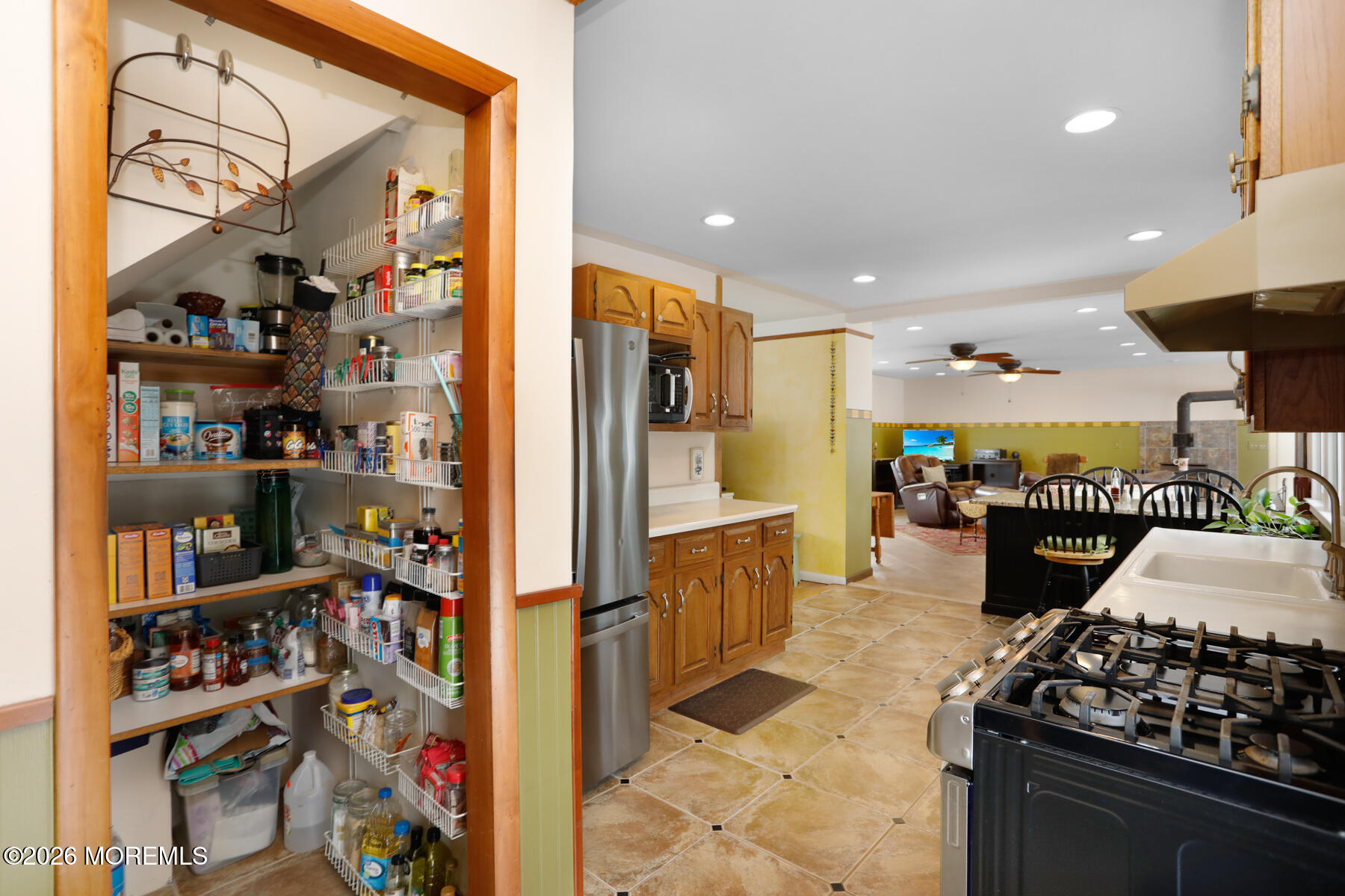 60 Sunset Drive Howell, NJ 07731 - Photo 6 of 56 a kitchen with stainless steel appliances granite countertop a refrigerator and a stove