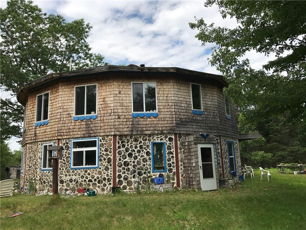 306 Stream Road Monroe, ME 04951 - Photo 1 of 33 Spectacular 16-sided cord wood house.