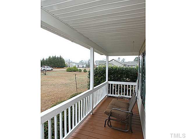 2409 Eleanor Rigby Court Raleigh, NC 27603 - Photo 3 of 14 A great area for sitting on front porch.