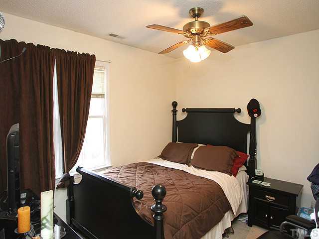 2409 Eleanor Rigby Court Raleigh, NC 27603 - Photo 9 of 14 Large bedroom with good size closet.