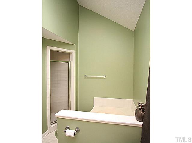 2409 Eleanor Rigby Court Raleigh, NC 27603 - Photo 10 of 14 Maser bath with dual vanity, garden tub and separate walk in shower.