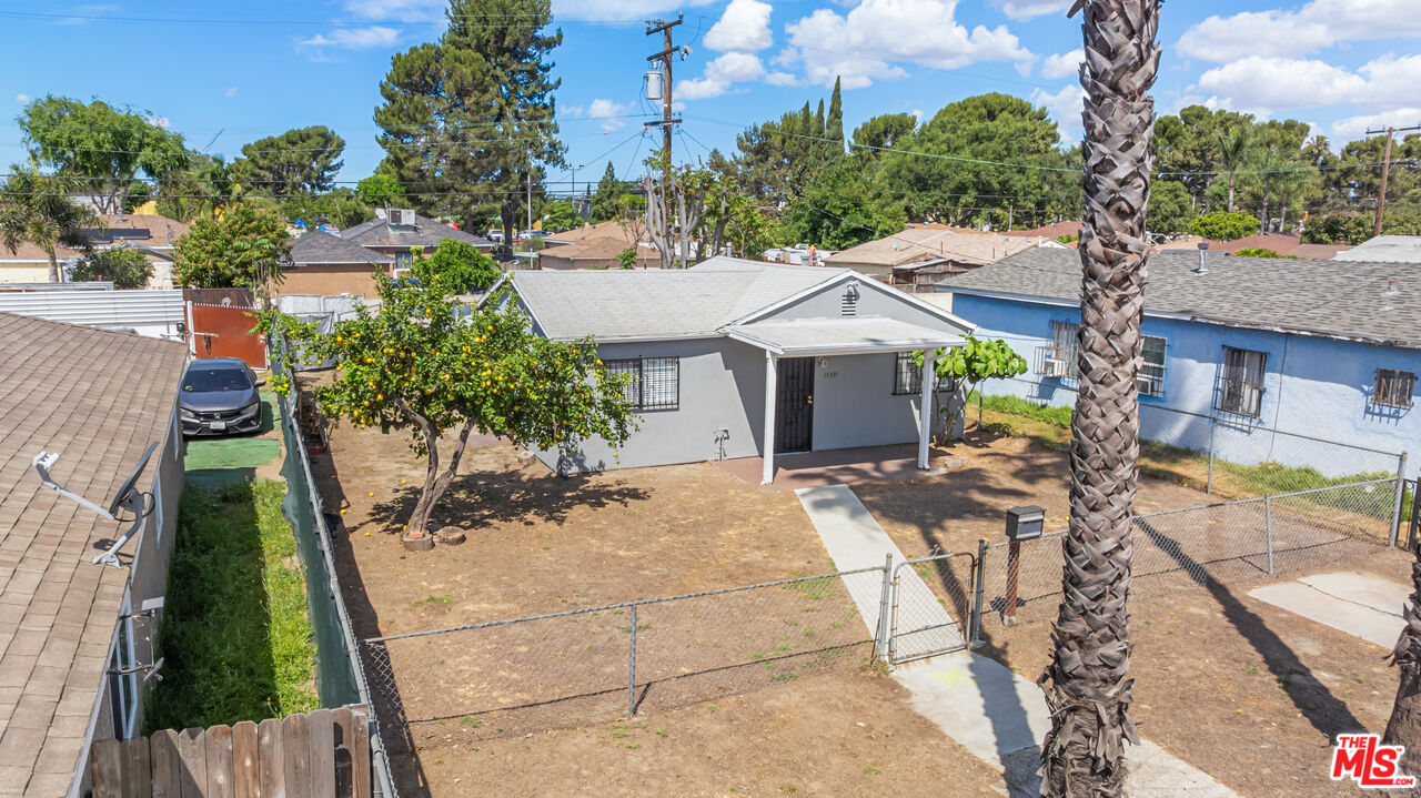 15321 South Frailey Avenue Compton, CA 90221 - Photo 14 of 19 a view of a house with backyard and sitting area