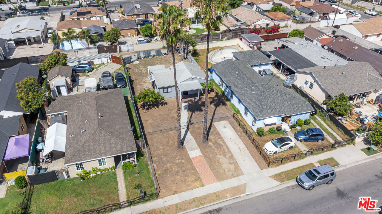 15321 South Frailey Avenue Compton, CA 90221 - Photo 2 of 19 an aerial view of residential houses with outdoor space