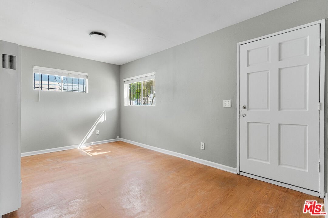 15321 South Frailey Avenue Compton, CA 90221 - Photo 3 of 19 an empty room with windows