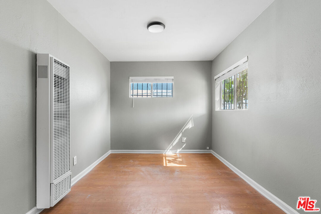 15321 South Frailey Avenue Compton, CA 90221 - Photo 4 of 19 a view of a livingroom with a window