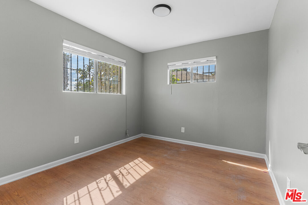 15321 South Frailey Avenue Compton, CA 90221 - Photo 5 of 19 a view of an empty room with a window