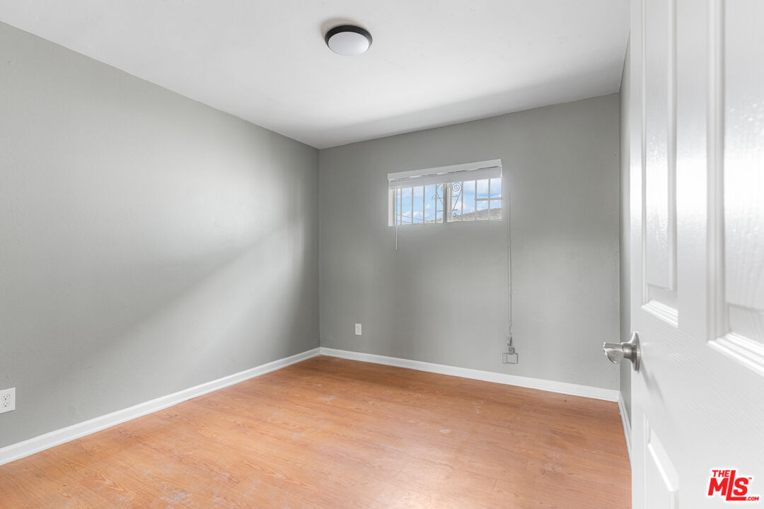 15321 South Frailey Avenue Compton, CA 90221 - Photo 6 of 19 an empty room with windows