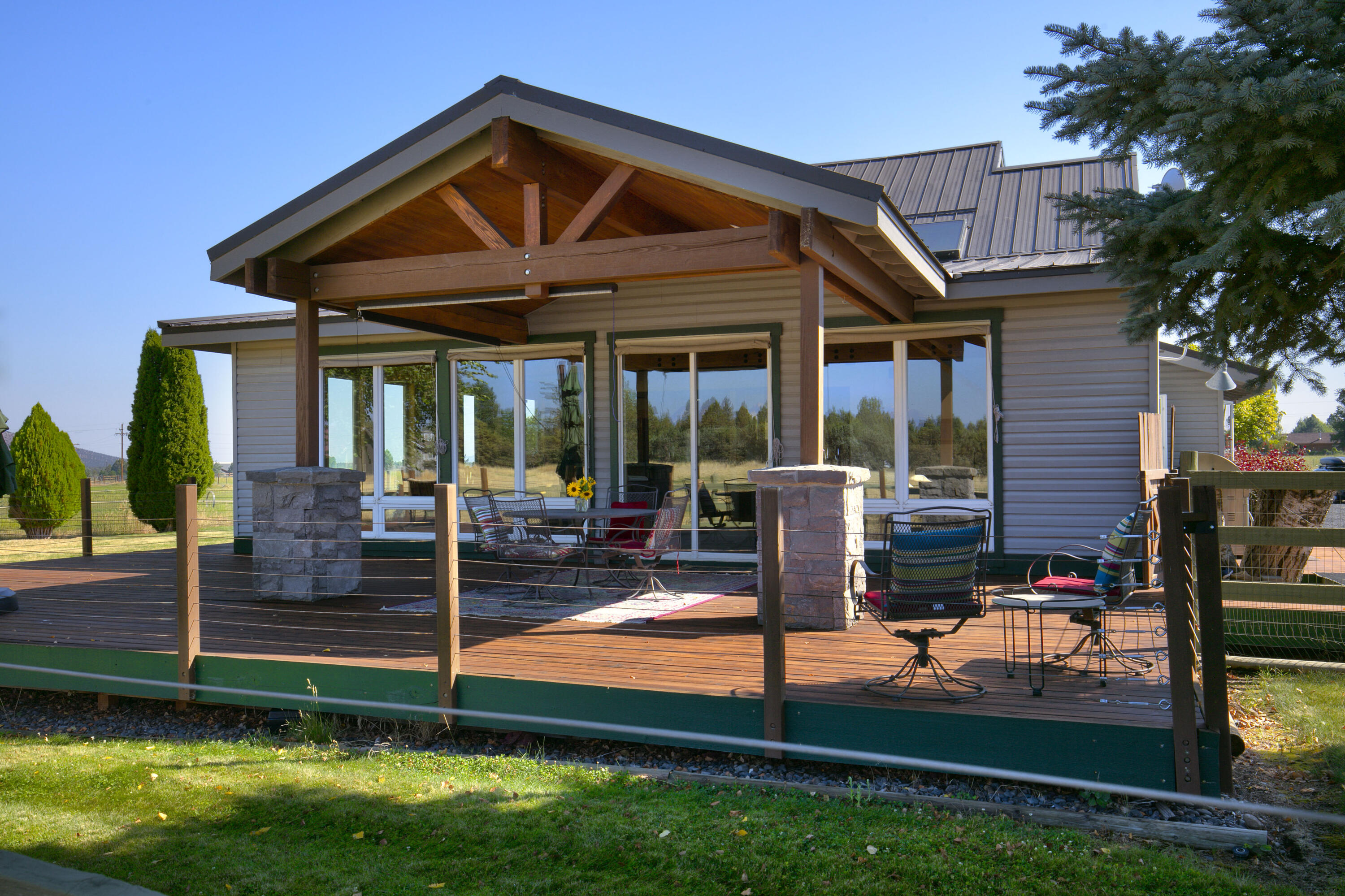 20155 Marsh Road Bend, OR 97703 - Photo 21 of 39 a view of a house with backyard and porch