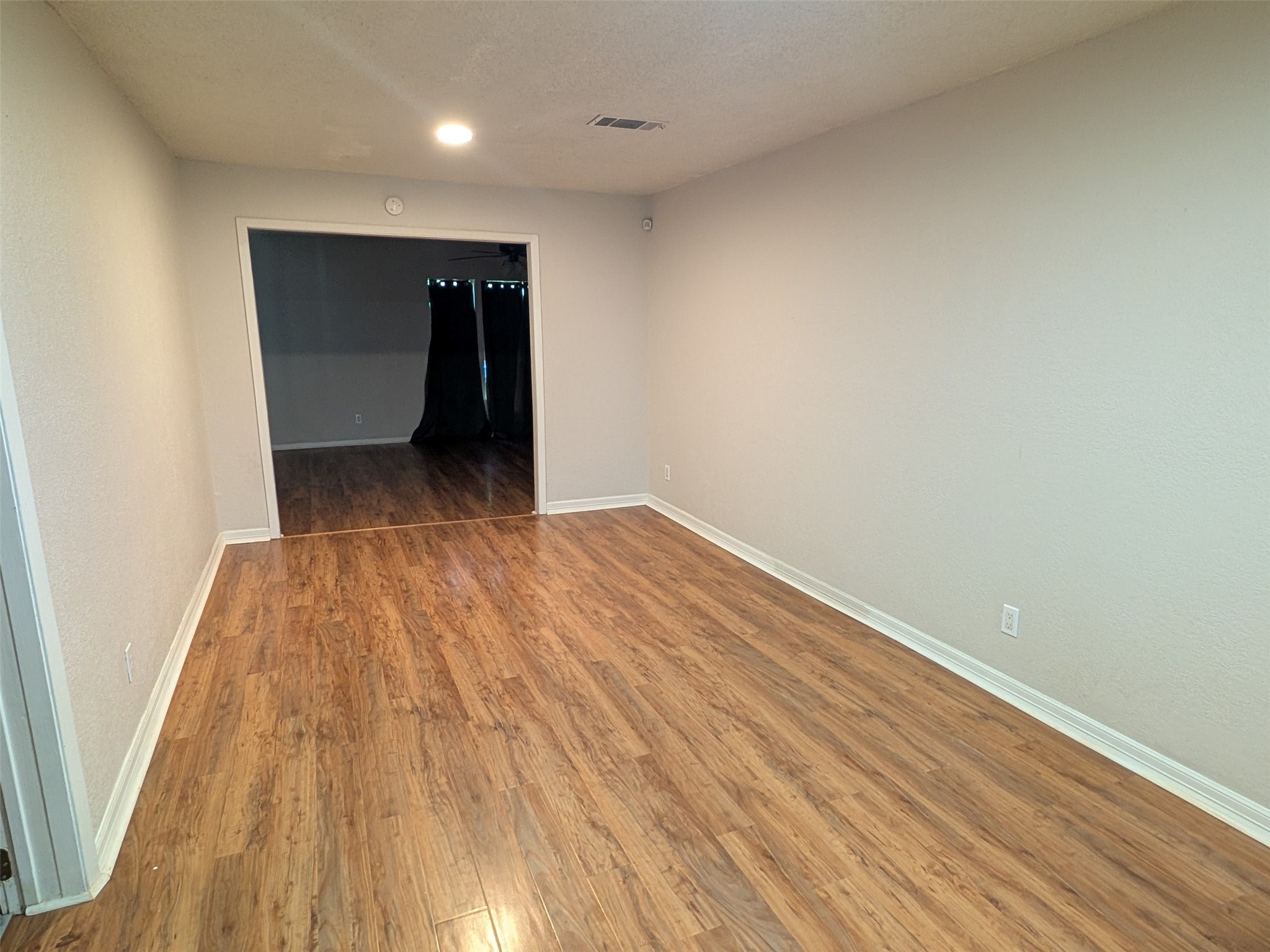 1909 Reese Street Liberty, TX 77575 - Photo 5 of 9 Dining room?extension of family room? You decide!