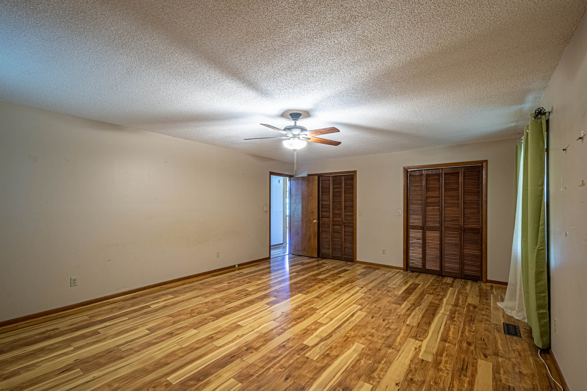 2515 Briar Patch Road Prospect, TN 38477 - Photo 21 of 43 a view of an empty room with wooden floor