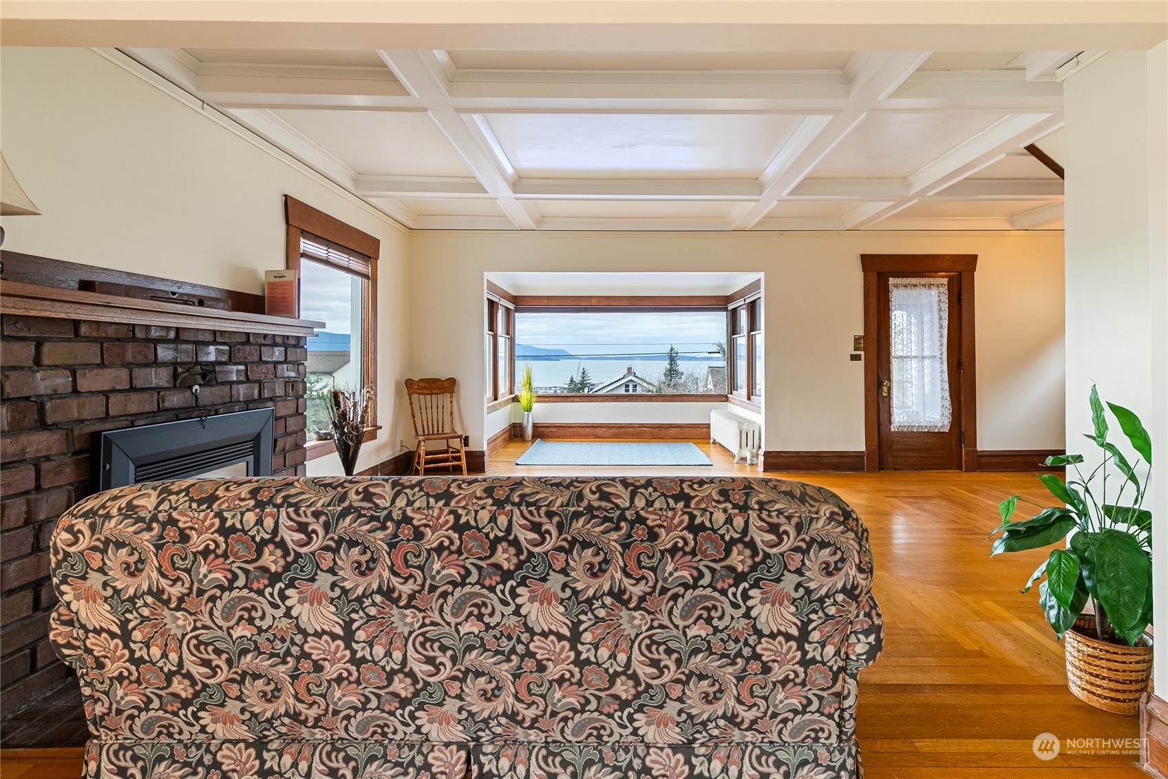 1015 14th Street Bellingham, WA 98225 - Photo 11 of 40 a bed sitting in a spacious bedroom next to a window