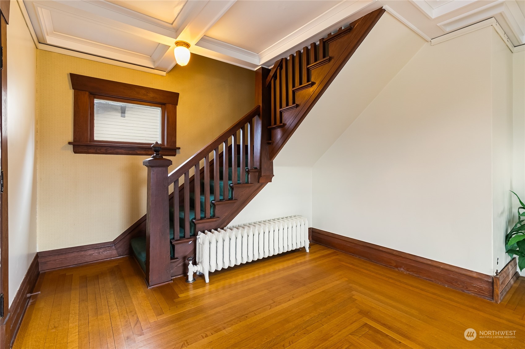 1015 14th Street Bellingham, WA 98225 - Photo 13 of 40 a view of staircase with wooden floor and a potted plant