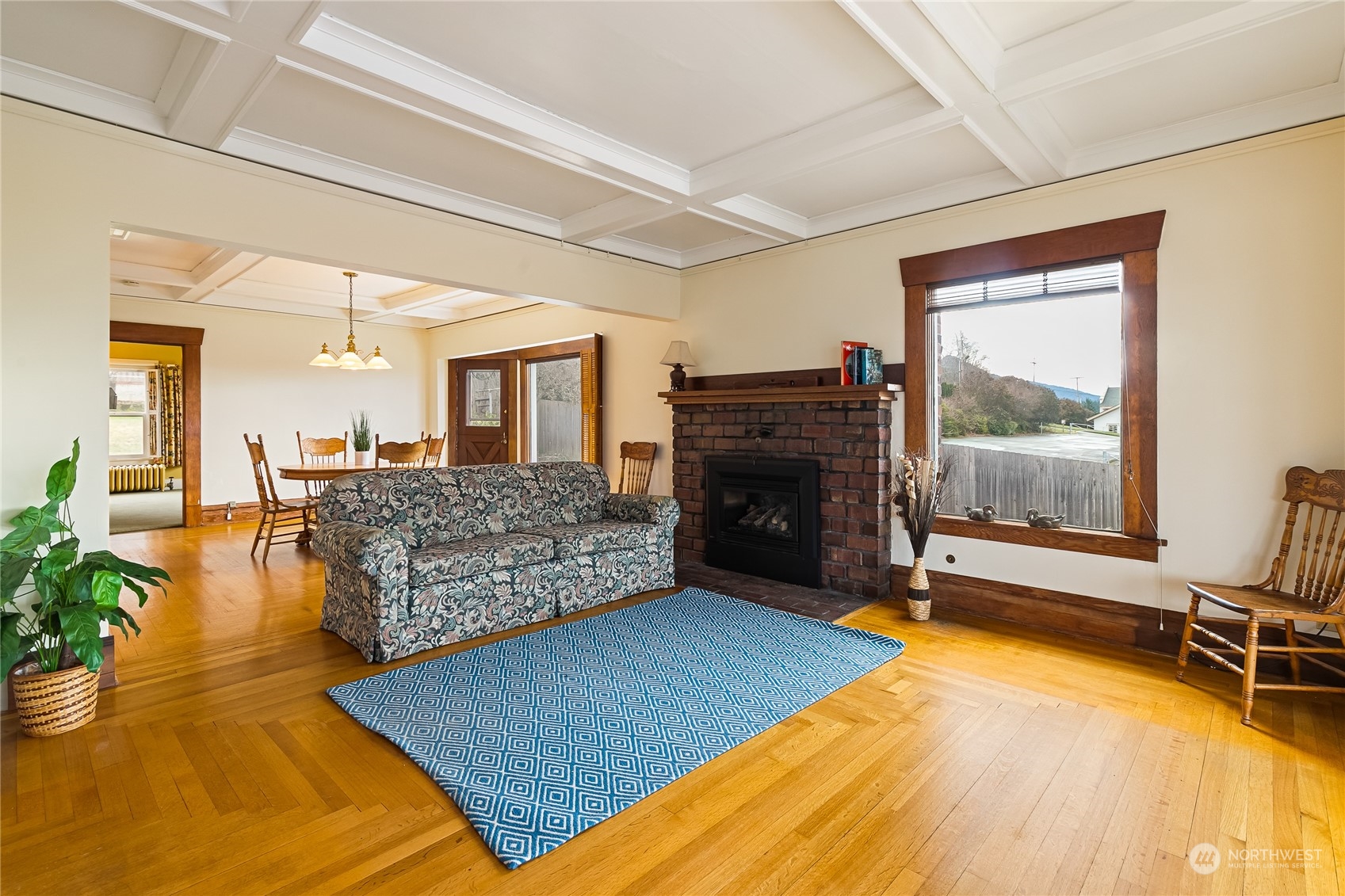 1015 14th Street Bellingham, WA 98225 - Photo 14 of 40 a living room with a couch and a fireplace