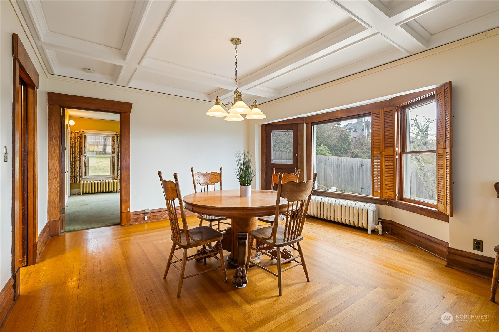 1015 14th Street Bellingham, WA 98225 - Photo 15 of 40 a view of a dining room with furniture window and wooden floor