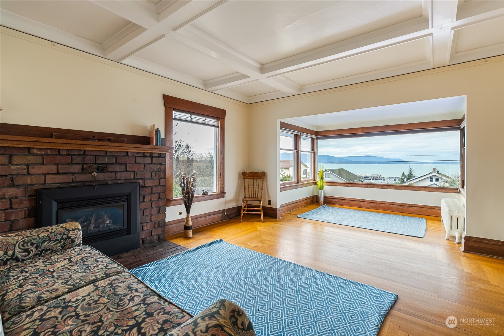 1015 14th Street Bellingham, WA 98225 - Photo 18 of 40 a living room with furniture and a fireplace