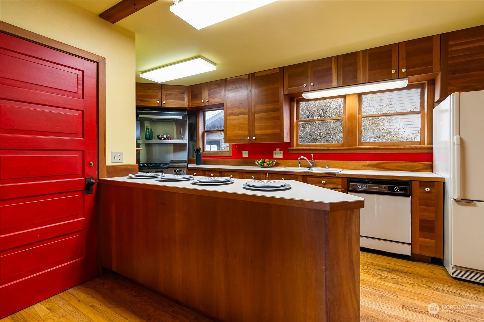 1015 14th Street Bellingham, WA 98225 - Photo 24 of 40 a view of kitchen with stainless steel appliances granite countertop a stove and a refrigerator
