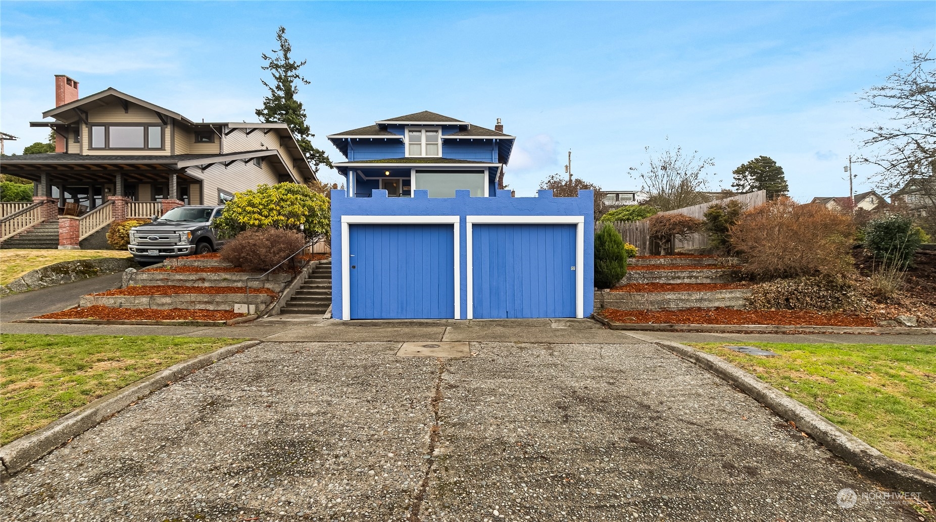 1015 14th Street Bellingham, WA 98225 - Photo 37 of 40 a view of a house with a swimming pool and a chairs