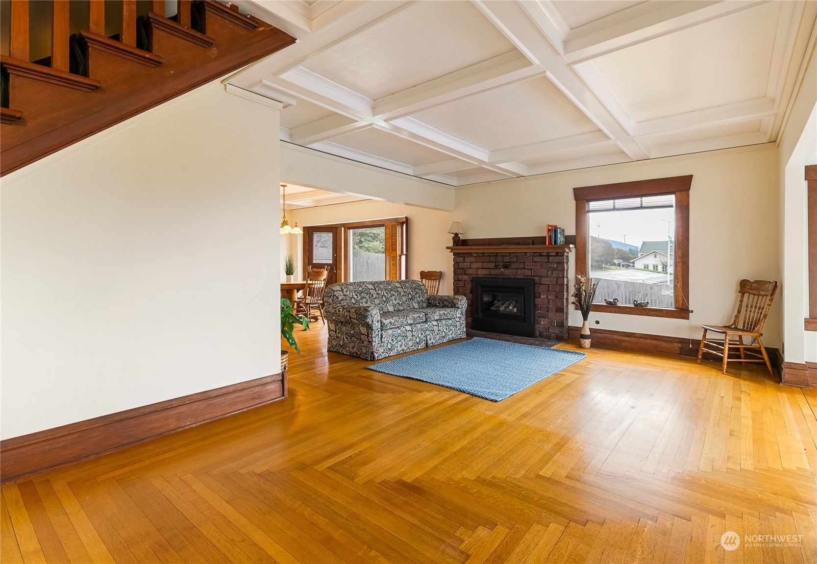 1015 14th Street Bellingham, WA 98225 - Photo 8 of 40 a living room with furniture and a fireplace