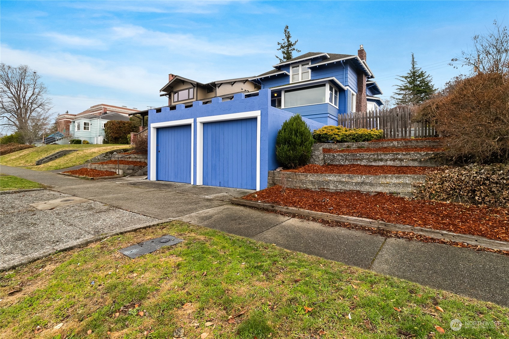 1015 14th Street Bellingham, WA 98225 - Photo 10 of 40 a view of a house with a small yard and sitting area