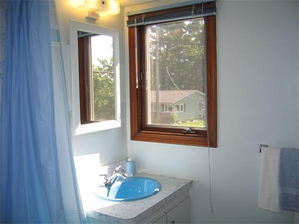350 Granby Road Chicopee, MA 01013 - Photo 18 of 28 a bathroom with a sink and a mirror