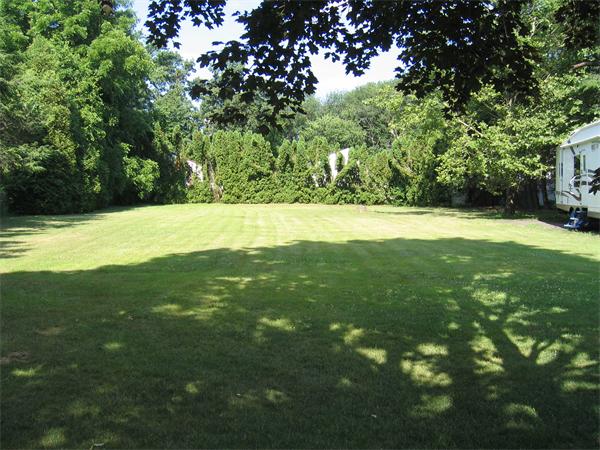 350 Granby Road Chicopee, MA 01013 - Photo 3 of 28 a view of a trees with a yard